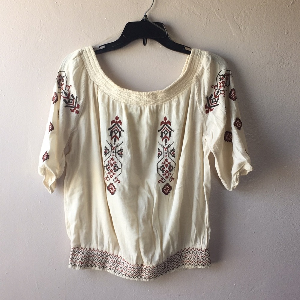 Cream off the shoulder shirt